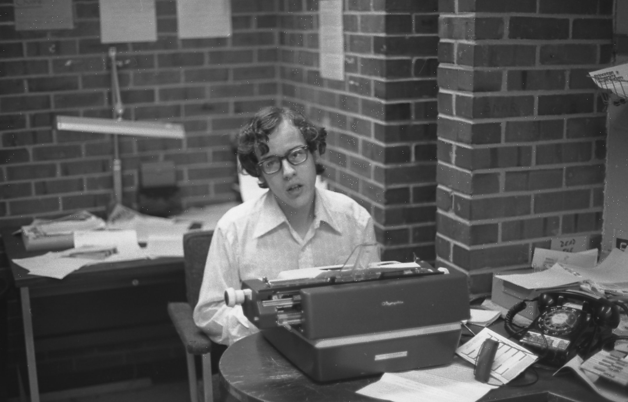 Dave Yuckman in the back of the News Room.